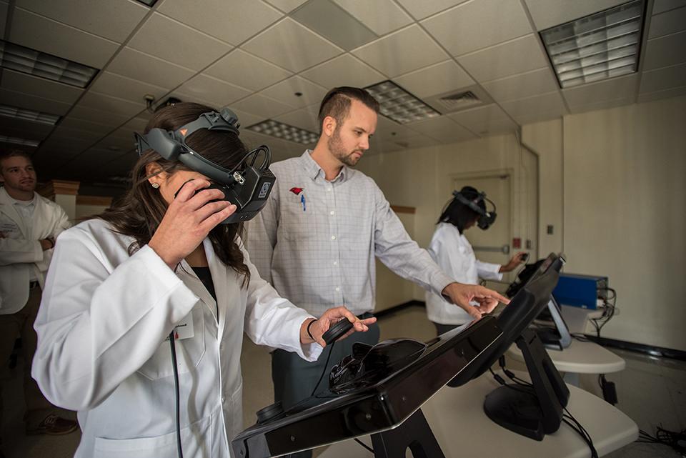 Optometry students in the eye lab